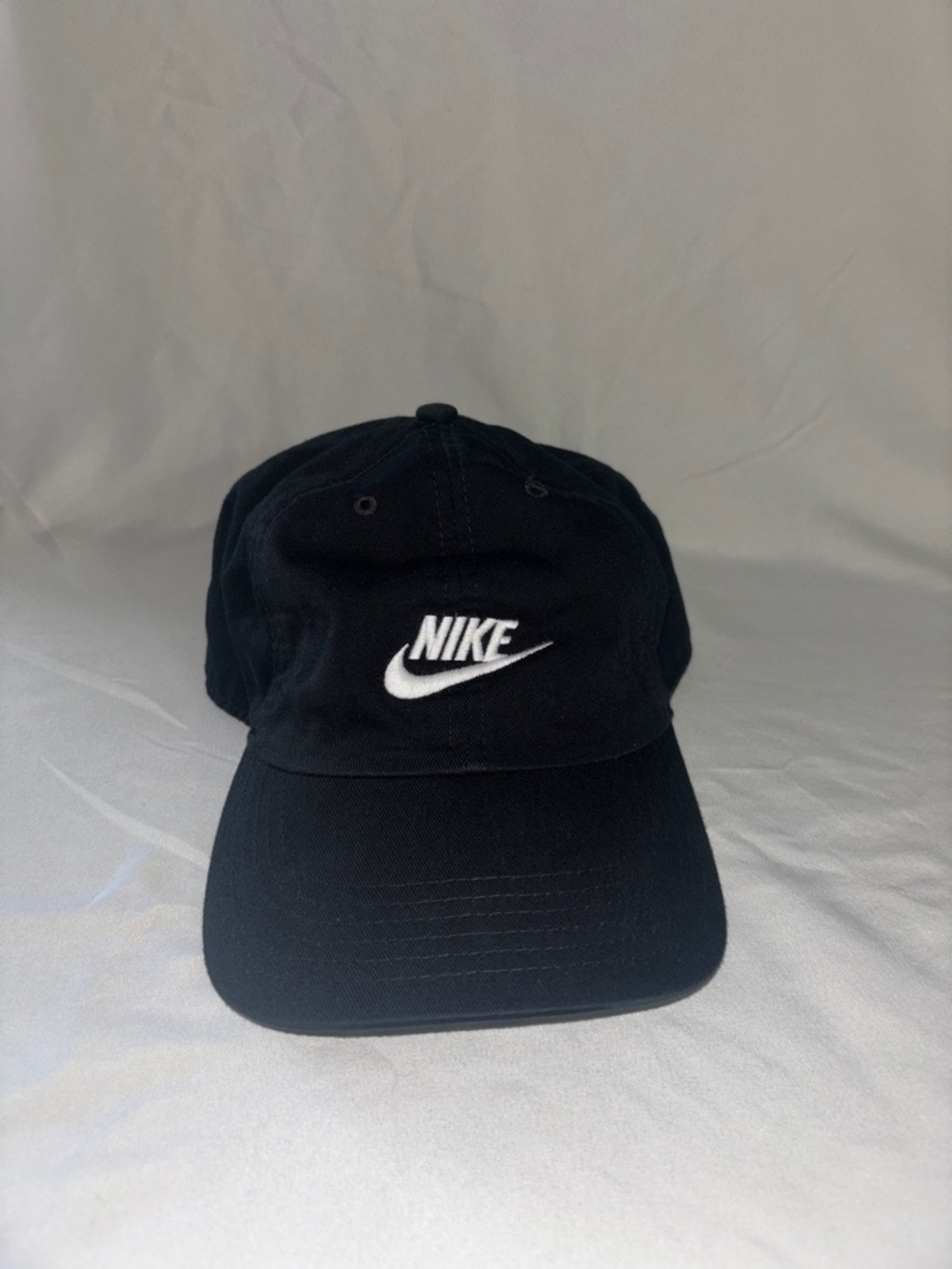 Nike Black Cap with White Swoosh Logo